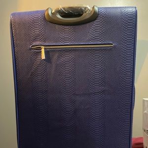 Tote&Carry. large roller suitcase